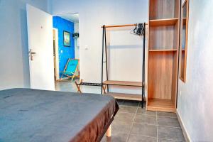 Postel nebo postele na pokoji v ubytování Villa Lanmè cosy, piscine privative & vue Mer