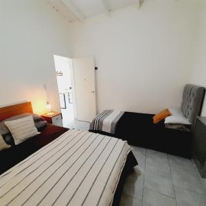 Ένα ή περισσότερα κρεβάτια σε δωμάτιο στο Hermoso departamento con estacionamiento