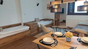 Postel nebo postele na pokoji v ubytování Apartman 109 Vila Nikola