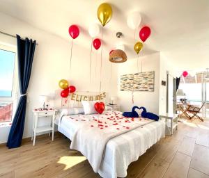 Łóżko lub łóżka w pokoju w obiekcie Sky Lovers Jacuzzi Fuerteventura