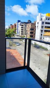 a view of a city street from a window at Summer Flat Ap308 Intermares in Cabedelo