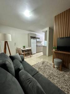 Kuchyň nebo kuchyňský kout v ubytování Charmoso apartamento na terra do Talian!