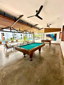 a billiard room with a pool table in it at Viva Jaco 9-05 in Jacó +17 photos
