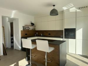 Cucina o angolo cottura di Lakesideview Keutschach am See