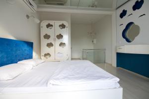 Postel nebo postele na pokoji v ubytování Element Suites