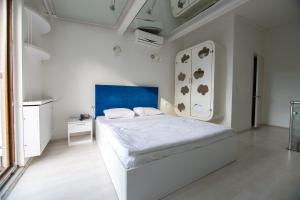 Postel nebo postele na pokoji v ubytování Element Suites