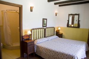 Giường trong phòng chung tại Molino El Vinculo