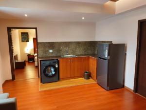 Kuchyň nebo kuchyňský kout v ubytování Park Avenue Hotel & Apartments Trichy