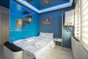 Postel nebo postele na pokoji v ubytování Element Suites