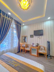 TV/trung tâm giải trí tại Sugar Land Villa Hotel