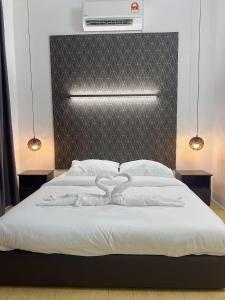 Postel nebo postele na pokoji v ubytování Highrise Haven