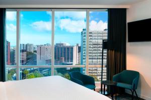 Postel nebo postele na pokoji v ubytování Four Points by Sheraton Auckland + 37 fotografií