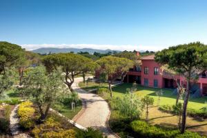 an aerial view of a house with trees and a road at Sheraton Cascais Resort - Hotel & Residences in Cascais