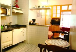 Dapur atau dapur kecil di Flats em frente ao Allianz Parque - HOTEL EM PERDIZES
