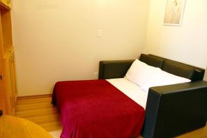 Katil atau katil-katil dalam bilik di Flats em frente ao Allianz Parque - HOTEL EM PERDIZES