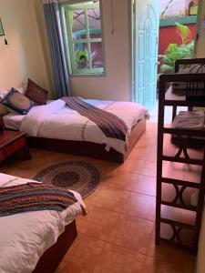 Ein Bett oder Betten in einem Zimmer der Unterkunft Phong lack Guest House