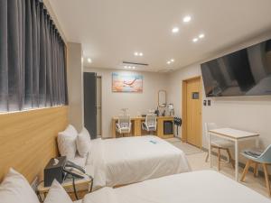 Voodi või voodid majutusasutuse Hotel Leo Changwon Central Branch toas