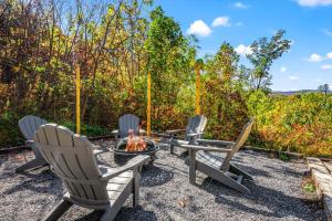 a group of chairs and a fire pit at Indoor Pool, Volleyball Beach, Mountain View, Luxury in Gatlinburg