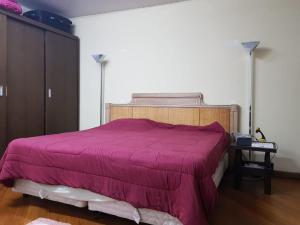 Postel nebo postele na pokoji v ubytování Casa Vergueiro