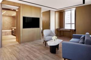 TV a/nebo společenská místnost v ubytování Daegu Marriott Hotel