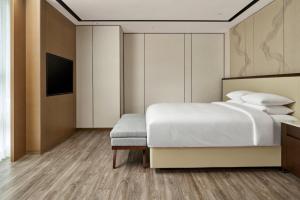 Postel nebo postele na pokoji v ubytování Daegu Marriott Hotel