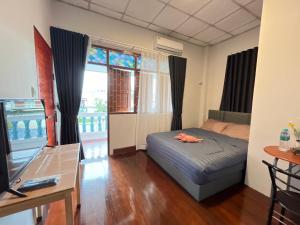 Postel nebo postele na pokoji v ubytování A Plus Hometel - บ้านเอ๋ โฮมเทล