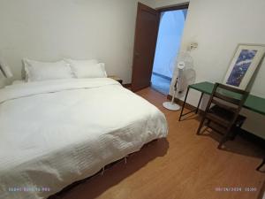 Rúm í herbergi á Cocina Mitho Chha BNB