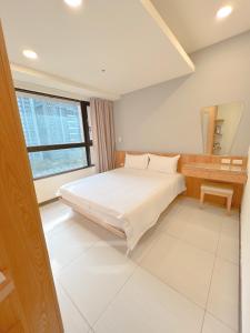 Снимка в галерията на Anping Nordic sea view three bedrooms в Тайнан