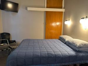 Postel nebo postele na pokoji v ubytování Merrylees Hotel