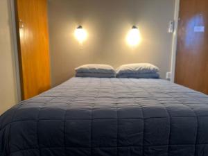 Postel nebo postele na pokoji v ubytování Merrylees Hotel