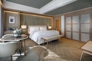 Postel nebo postele na pokoji v ubytování The Westin Madrid Cuzco