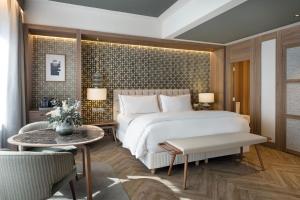 Postel nebo postele na pokoji v ubytování The Westin Madrid Cuzco