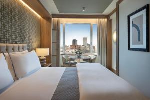 Postel nebo postele na pokoji v ubytování The Westin Madrid Cuzco