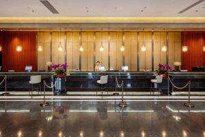 Vstupní hala nebo recepce v ubytování Jian Guo Hotel Yantai Phoenix Building