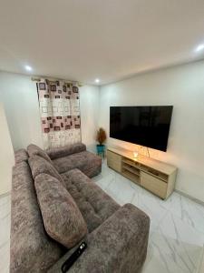 Μια τηλεόραση ή/και κέντρο ψυχαγωγίας στο Yeff Casa Mia en Cali +14 φωτογραφίες