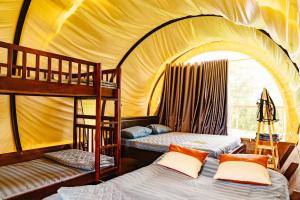 Postel nebo postele na pokoji v ubytování Panorama Glamping