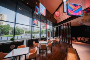 Predel za sedenje v nastanitvi Grand Metropark Hotel Shanghai Pudong