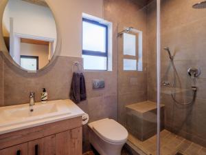 a bathroom with a sink toilet and a shower at The Lofts on Manaar in Durban +26 photos