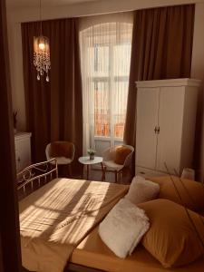 Postel nebo postele na pokoji v ubytování Tomas Apartments Silver