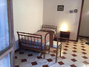 A bed or beds in a room at Scicli Amore Mio