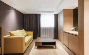 Predel za sedenje v nastanitvi Grand Metropark Hotel Shanghai Pudong