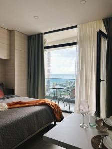 Postel nebo postele na pokoji v ubytování Green Side Apart Hotel gonio adjara georgia
