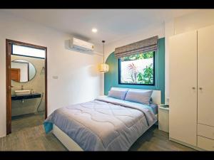 Postel nebo postele na pokoji v ubytování Oasis 4BR Private Pool Villa in central Ao Nang