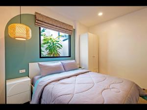 Postel nebo postele na pokoji v ubytování Oasis 4BR Private Pool Villa in central Ao Nang