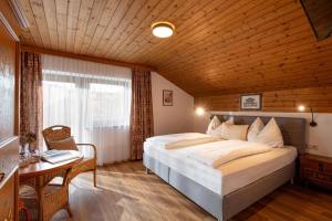Letto o letti in una camera di Gästehaus Kopp
