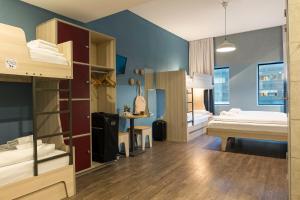 Postel nebo postele na pokoji v ubytování MEININGER Hotel Amsterdam City West