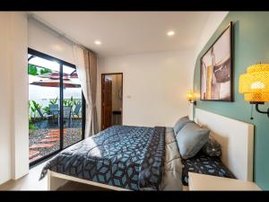 Postel nebo postele na pokoji v ubytování Oasis 4BR Private Pool Villa in central Ao Nang