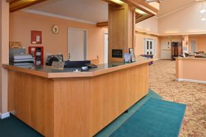 an empty lobby with a reception counter in a office at Fremont Inn in Lakeview