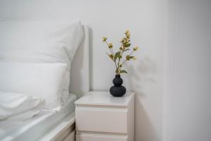 Ένα ή περισσότερα κρεβάτια σε δωμάτιο στο Sanierte Wohnung "Luca" fußläufig ins Zentrum +2 φωτογραφίες