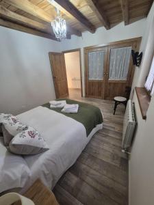 Łóżko lub łóżka w pokoju w obiekcie Casa Rural Rincón